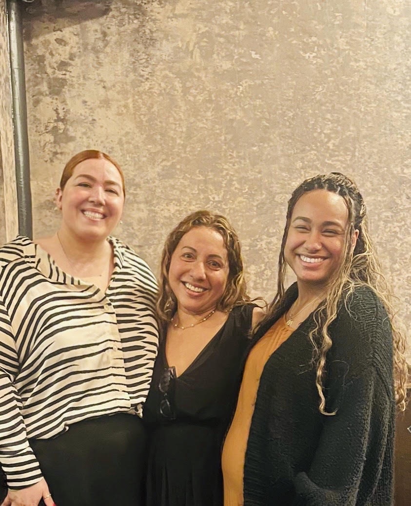 Three women on the JBK Tax team, standing together and smiling.
